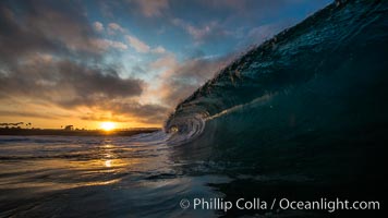 Sunrise breaking wave, dawn surf