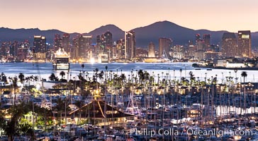 Sunrise City Lights on San Diego Bay, with San Diego Yacht Club marina.  Mount San Miguel and Lyons Peak are the distance