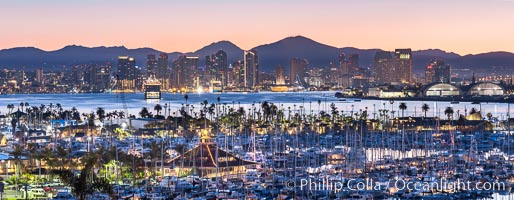 Sunrise City Lights on San Diego Bay, with San Diego Yacht Club marina.  Mount San Miguel and Lyons Peak are in the distance