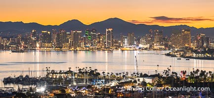 Sunrise Dawns over San Diego Harbor, Mount San Miguel in center, Mount Lyons to the left, and Harbor Island in the foreground. Viewed from Point Loma