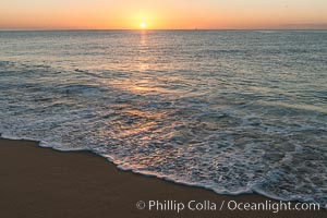 Sunrise on Medano Beach, on the coast of Cabo San Lucas, Mexico