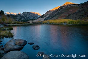 Sunrise on Paiute Peak, reflected in North Lake in the eastern Sierra Nevada, in autumn, Bishop Creek Canyon Sierra Nevada Mountains