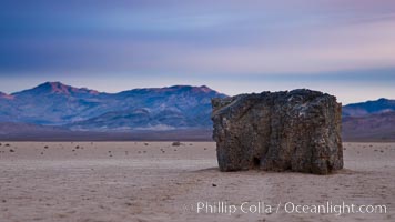 Sunrise on the Racetrack Playa. The sliding rocks, or sailing stones, move across the mud flats of the Racetrack Playa, leaving trails behind in the mud. The explanation for their movement is not known with certainty, but many believe wind pushes the rocks over wet and perhaps icy mud in winter, Death Valley National Park, California