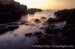 Sunset, tidepools and blurry water and mist, Pacific Grove, California