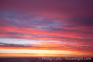 Sunset clouds, detail and colors, at sea on the open ocean between the Falkland Islands and South Georgia Island