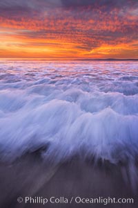 Sunset and incoming surf, gorgeous colors in the sky and on the ocean at dusk, the incoming waves are blurred in this long exposure. Carlsbad, California, USA, natural history stock photograph, photo id 27161