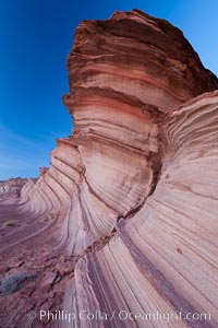 The Great Wall, Navajo Tribal Lands, Arizona. Sandstone "fins", eroded striations that depict how sandstone -- ancient compressed sand -- was laid down in layers over time.  Now exposed, the layer erode at different rates, forming delicate "fins" that stretch for long distances, Page