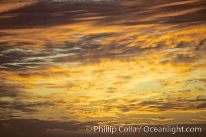 Clouds at sunset, rich warm colors and patterns, Maui