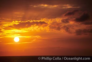 Clouds at sunset, rich warm colors and patterns, Maui