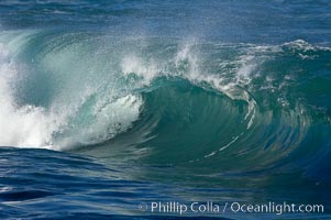 Wave breaking at Boomer Beach and La Jolla Cove near San Diego