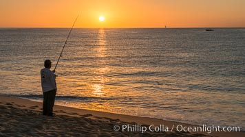 Surf fisherman on Medano Beach at sunrise, Cabo San Lucas, Mexico