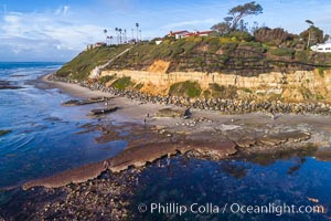 Swamis Reef exposed at extreme low King Tide, Encinitas, aerial panoramic photo