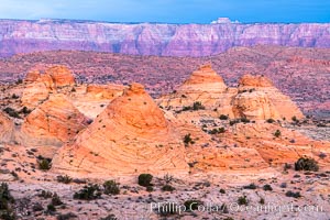 Teepee rocks at sunrise with the Vermillion Cliffs in the distance, Page, Arizona