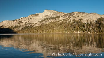 Tenaya Lake at sunset, panoramic view looking north, with Tenaya Peak (10,280') on the right and Medlicott Dome (9,880') on the left.  Tenaya Lake lies at 8,150' in the heart of Yosemite's high country, Yosemite National Park, California