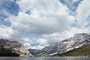 Tenaya Lake in Yosemite National Park's high country, with Pywiack Dome, Medlicott Dome and Mount Conness in the distance