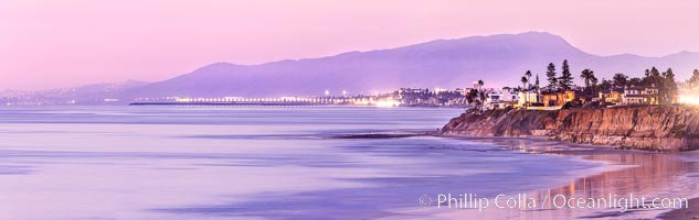 Carlsbad Coast at Sunset, Terramar and the Oceanside Pier, with Camp Pendleton and the San Onofre power plant in the distance on this incredibly clean and crisp evening view.  Rising in the distance is San Onofre Mountain (1722') topped by a tall signal tower, one of the southern peaks in the Santa Ana Mountains