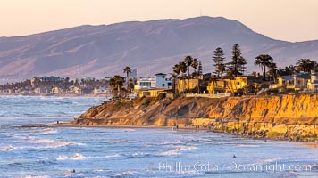 Terramar Sunset, viewed from North Ponto with Oceanside and Camp Pendleton in the distance. Rising in the distance is San Onofre Mountain (1722') topped by a tall signal tower, one of the southern peaks in the Santa Ana Mountains, Carlsbad, California