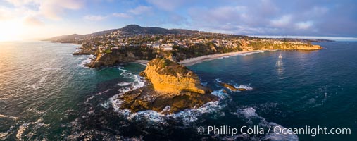 Three Arch Bay, Mussel Cove and Three Arch Rock, Laguna Beach Coastline, Aerial Photo.  The Whale / Turtle Rock is front and center