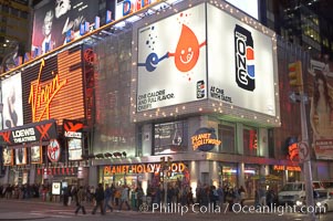 Neon lights fill Times Square at night, New York City