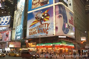 Neon lights fill Times Square at night, New York City