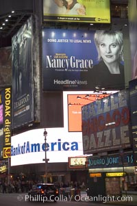 Neon lights fill Times Square at night, New York City