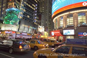 Neon lights fill Times Square at night, New York City