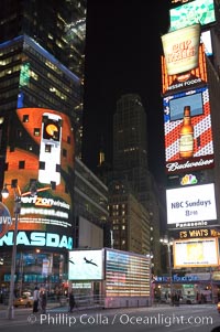 Neon lights fill Times Square at night, New York City