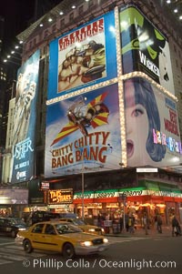 Neon lights fill Times Square at night, New York City