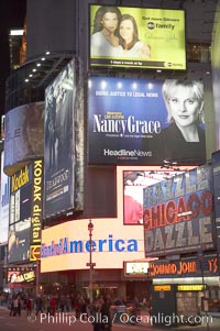 Neon lights fill Times Square at night, New York City