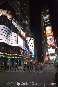 Neon lights fill Times Square at night, New York City