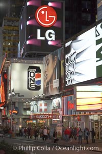 Neon lights fill Times Square at night, New York City