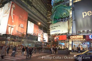 Neon lights fill Times Square at night, New York City