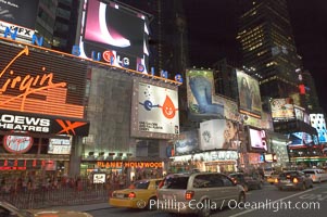 Neon lights fill Times Square at night, New York City