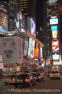 Neon lights fill Times Square at night, New York City