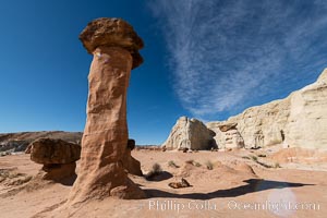 Toadstool Hoodoos near the Paria Rimrocks, Grand Staircase Escalante National Monument. These hoodoos form when erosion occurs around but not underneath a more resistant caprock that sits atop of the hoodoo spire, Grand Staircase - Escalante National Monument, Utah