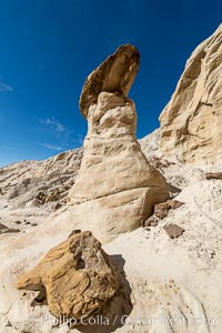 Toadstool Hoodoos near the Paria Rimrocks, Grand Staircase Escalante National Monument. These hoodoos form when erosion occurs around but not underneath a more resistant caprock that sits atop of the hoodoo spire, Grand Staircase - Escalante National Monument, Utah