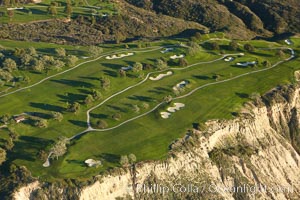 Torrey Pines Golf Course, south course holes 2, 4 and 5.  Torrey Pines golf course, situated atop the magnificent 300 foot tall seacliffs, offers majestic views of the Pacific Ocean south to La Jolla.  Scattered around the course are found Torrey pine trees, one of the rare species of pines in the world, San Diego, California