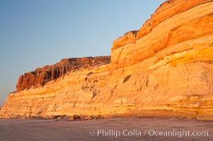 Sandstone cliffs rise above the beach at Torrey Pines State Reserve, San Diego, California