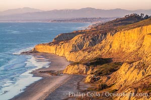 Torrey Pines sea cliffs at sunset, Flat Rock at low tide, looking north.