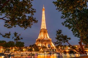 La Tour Eiffel. The Eiffel Tower is an iron lattice tower located on the Champ de Mars in Paris, named after the engineer Gustave Eiffel, who designed the tower in 1889 as the entrance arch to the 1889 World's Fair. The Eiffel tower is the tallest structure in Paris and the most-visited paid monument in the world