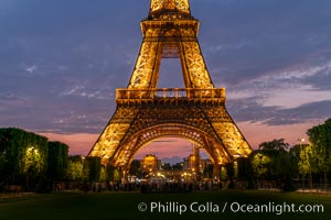 La Tour Eiffel. The Eiffel Tower is an iron lattice tower located on the Champ de Mars in Paris, named after the engineer Gustave Eiffel, who designed the tower in 1889 as the entrance arch to the 1889 World's Fair. The Eiffel tower is the tallest structure in Paris and the most-visited paid monument in the world