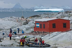 Tourists land on Peterman Island, near the Argentine research hut