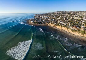 Tourmaline Beach and Surf Park aerial photo, with waves wrapping around False Point, La Jolla