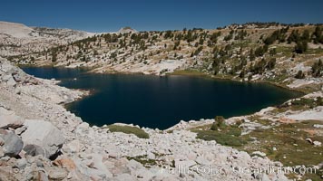 Townsley Lake, viewed from the approach to Hanging Basket Lake, showing the rugged talus slopes that characterize many Sierra Nevada peaks, Yosemite National Park, California