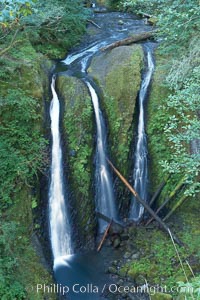 Triple Falls, in the upper part of Oneonta Gorge, fall 130 feet through a lush, beautiful temperate rainforest, Columbia River Gorge National Scenic Area, Oregon