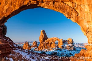 Turret Arch through North Window, winter, sunrise, Arches National Park, Utah