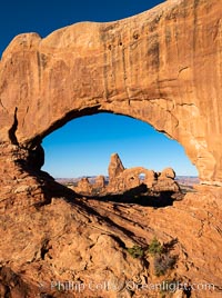 Turret Arch viewed through North Window at Sunrise. Arches National Park, Utah, USA, natural history stock photograph, photo id 37861