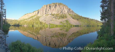 Panorama of cliffs rising about Twin Lakes at sunrise, Mammoth Lakes