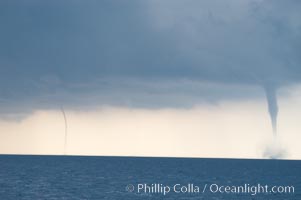 Two simultaneous waterspouts.  Waterspouts are tornadoes that form over water, Great Isaac Island