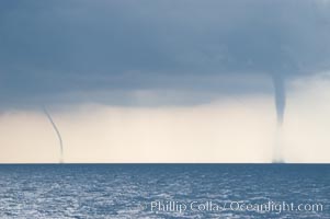 Two simultaneous waterspouts.  Waterspouts are tornadoes that form over water, Great Isaac Island